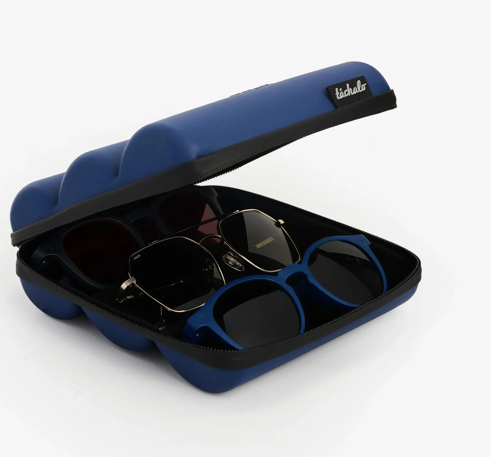 Open blue Tris case holding three pairs of glasses