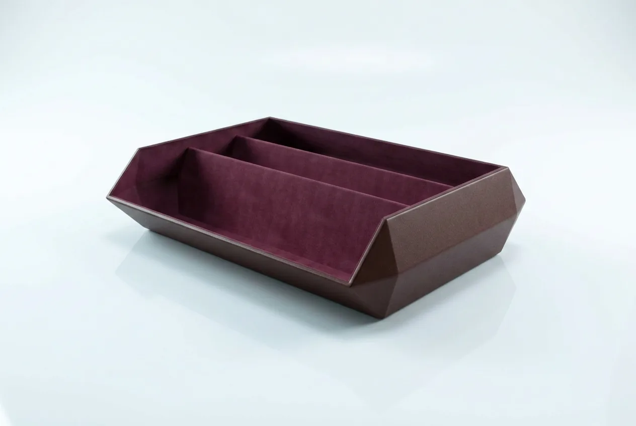 Open rectangular case with a burgundy interior